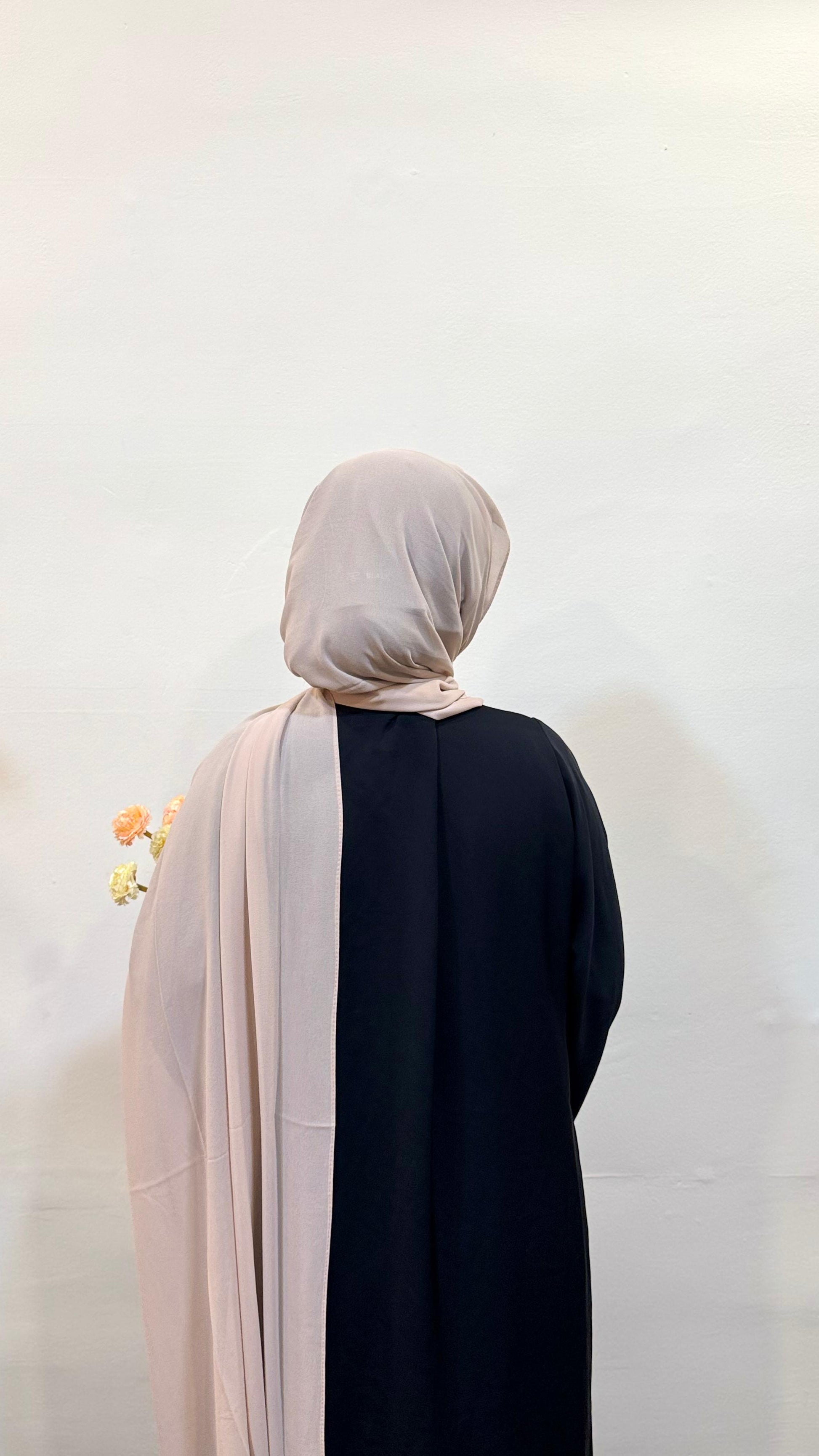 Duststorm beige hijab with a warm, neutral tone, offering a calm and understated elegance.