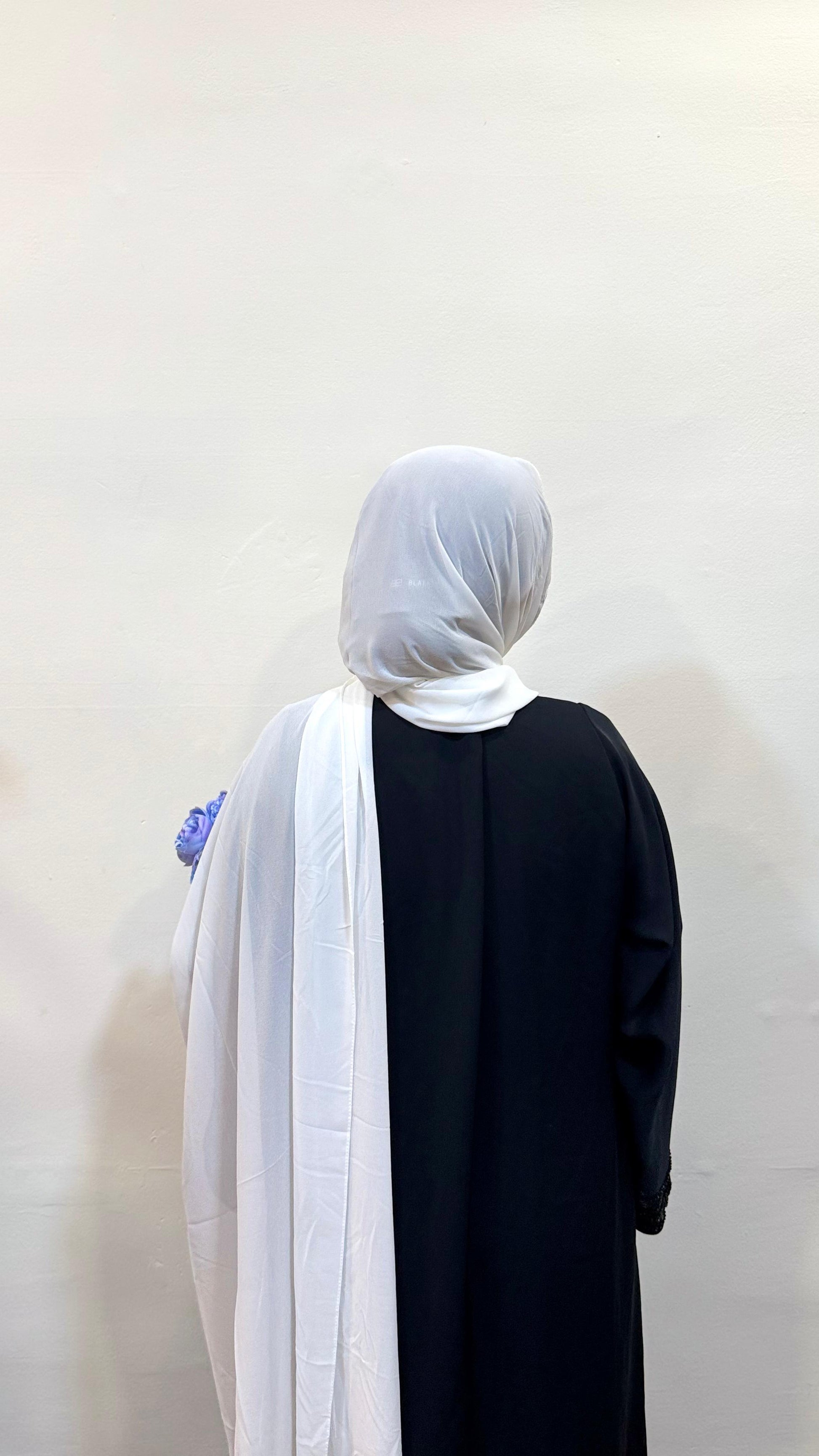 White hijab with a pure, bright tone, offering a crisp and timeless look.