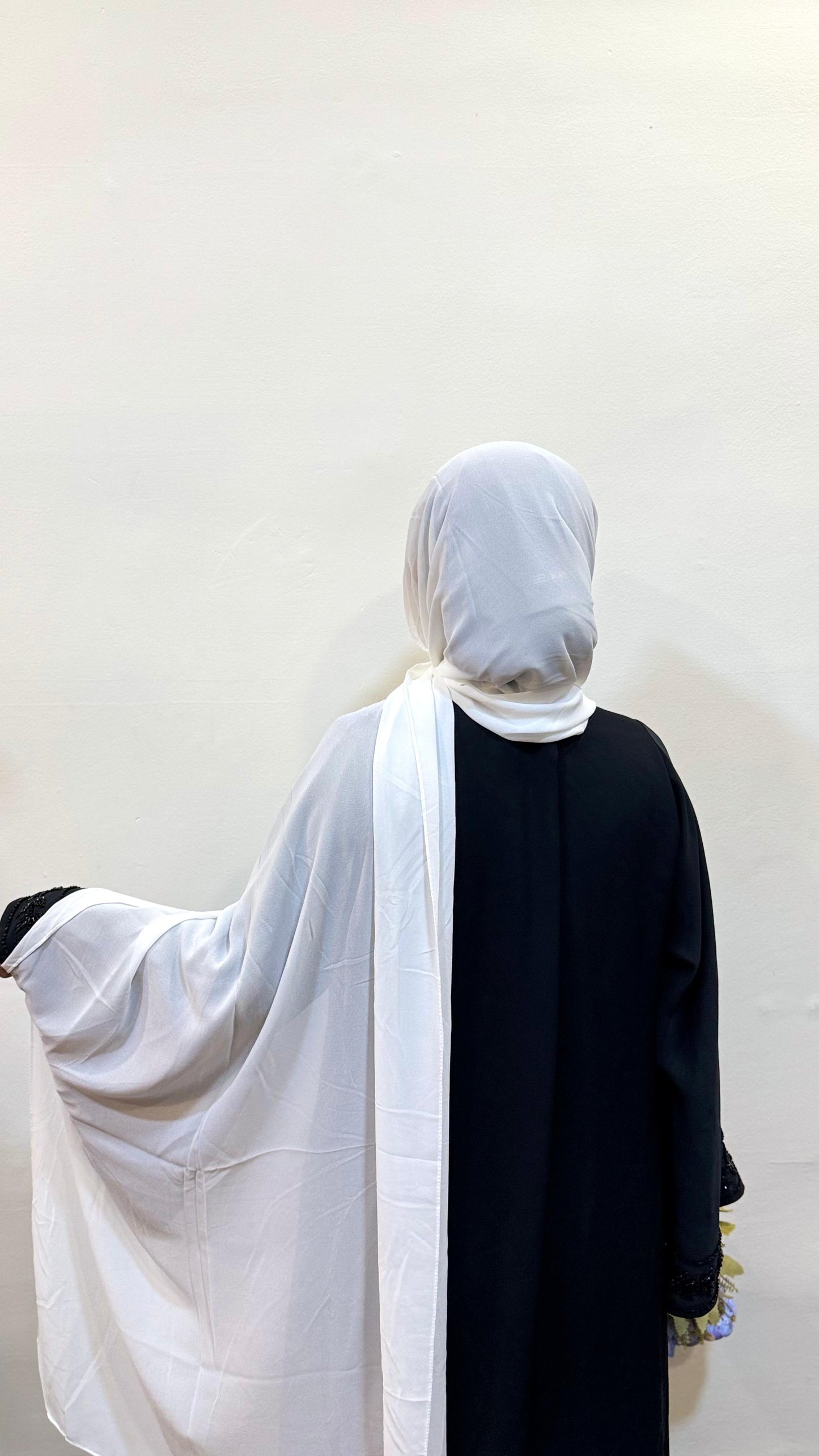White hijab with a pure, bright tone, offering a crisp and timeless look.