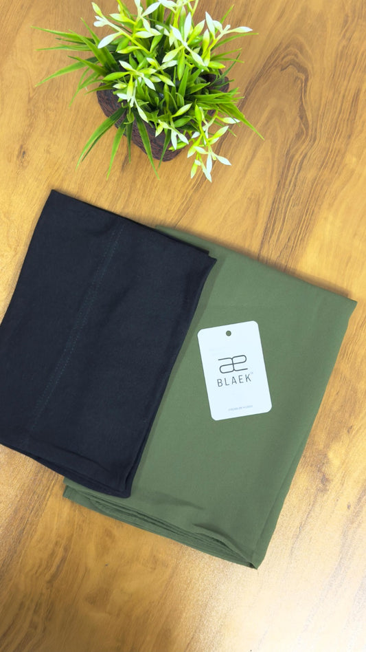 Natural olive hijab with a smooth, fitted black cap.