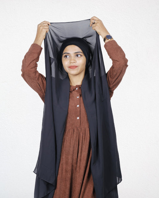 Effortless styling with the Black Slider Mag Hijab’s built-in cap design.