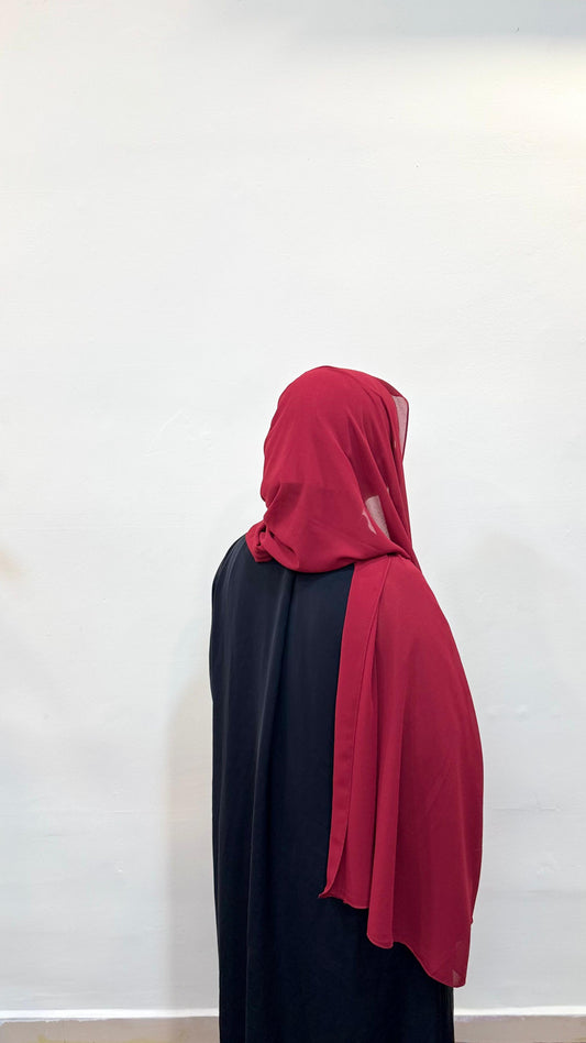 Cherry red hijab with a bold, vibrant hue, adding a pop of color to the look.