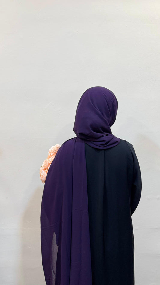 Eggplant purple hijab with a deep, luxurious tone, adding a bold yet sophisticated flair.