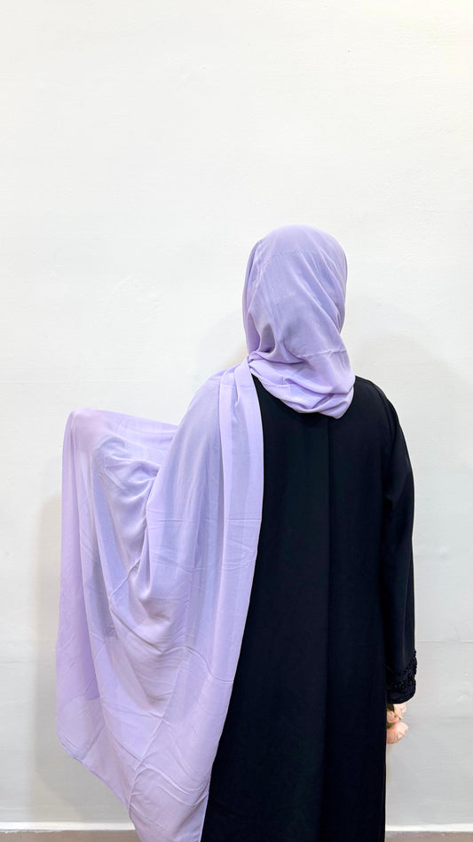 Lavender hijab with a gentle pastel hue, adding a dreamy and delicate touch to the look.