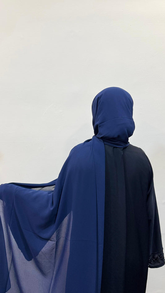 Navy blue hijab with a dark, serene shade, offering a refined and versatile look.