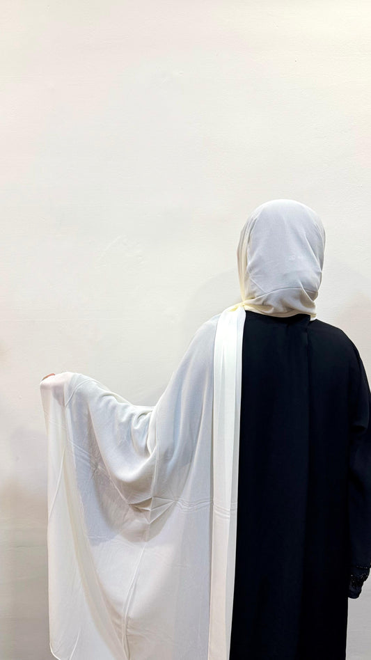 Vanilla hijab with a soft blend of off-white and yellow, creating a warm, creamy tone for a gentle, elegant look.