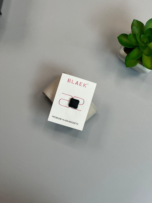 Modern diamond-shaped hijab magnet with a smooth surface.