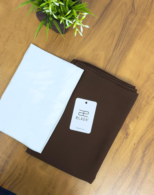 White cap combined with mocha hijab, folded view.