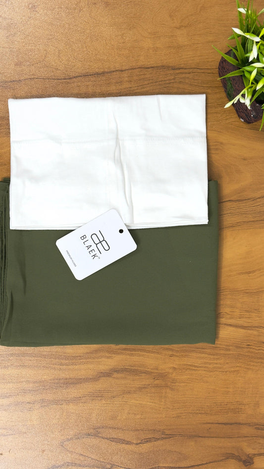 Olive green hijab attached to white cap, folded slider mag style.